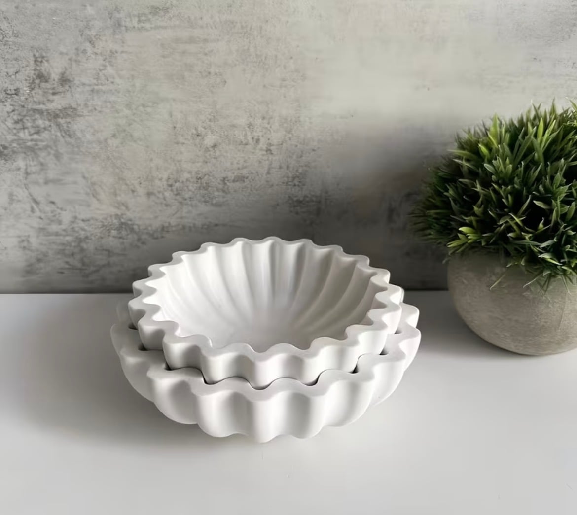 Deep eco resin bowl with a frilled ruffled rim, nested in a set of sizes